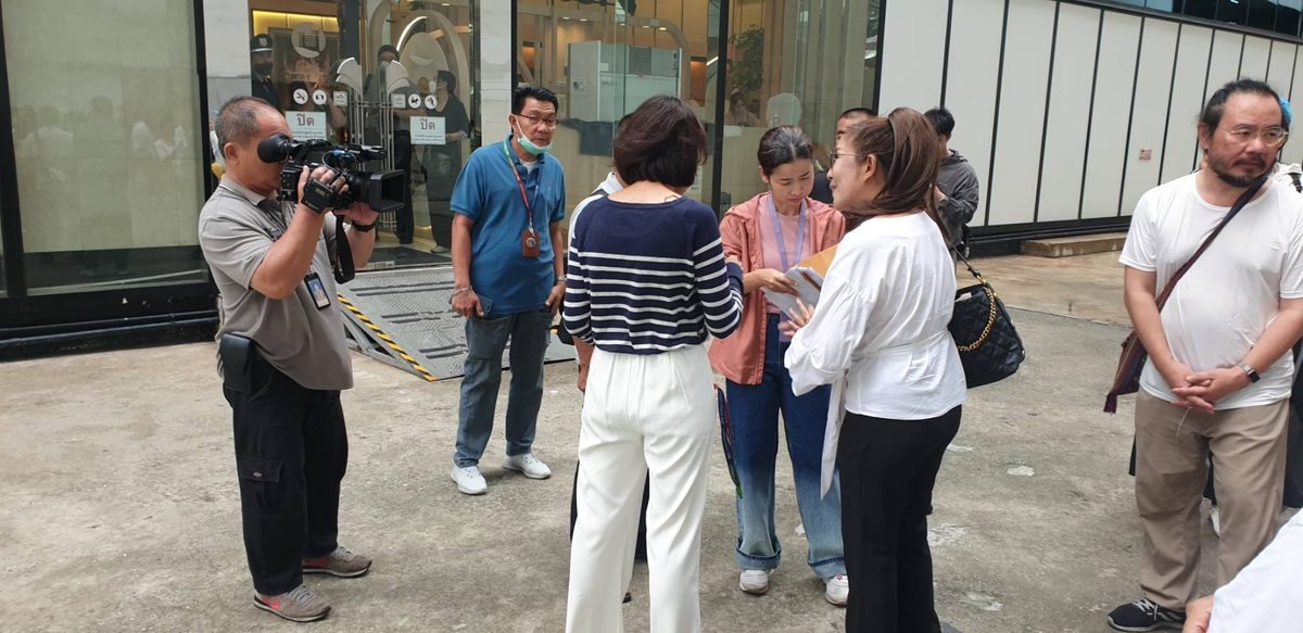Channel 3 camera crew filming the delegation — evidence the story was recorded